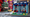 Minifigures sitting on a bus stop, turned swing